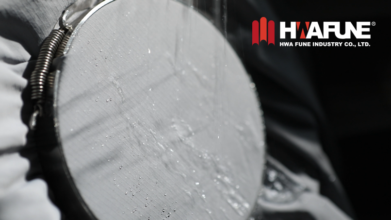 Hwafune water repellency test demonstrating durable water repellent performance on functional fabric