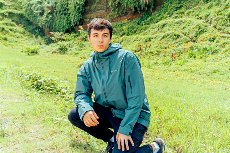 Man wearing PORLITE outdoor jacket in mountaineering scene